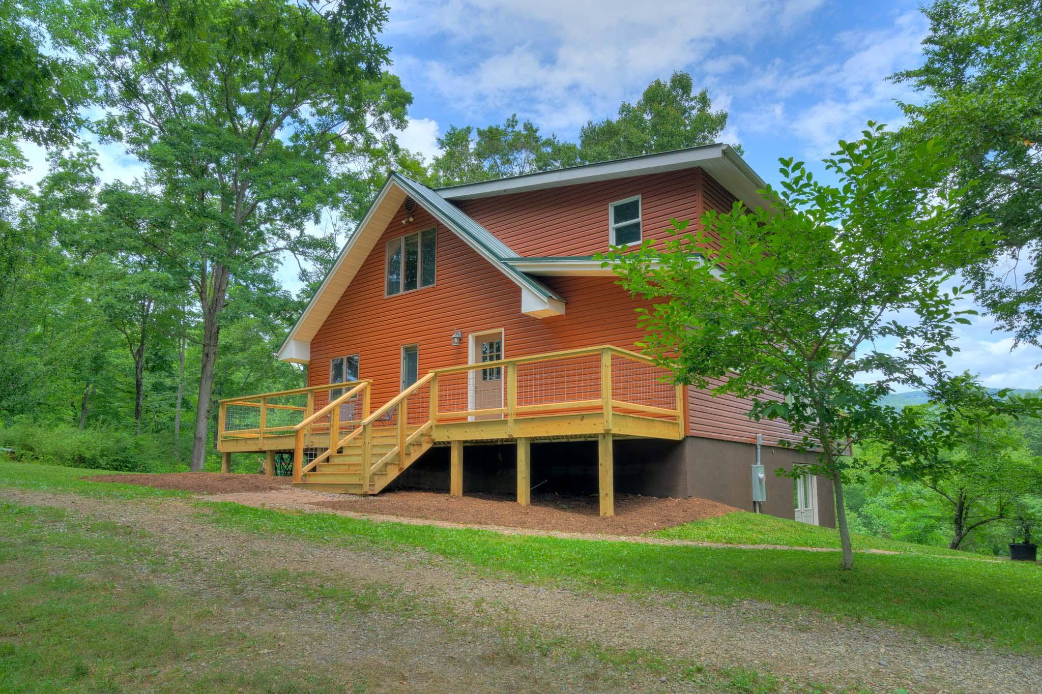 a view of a house with a yard