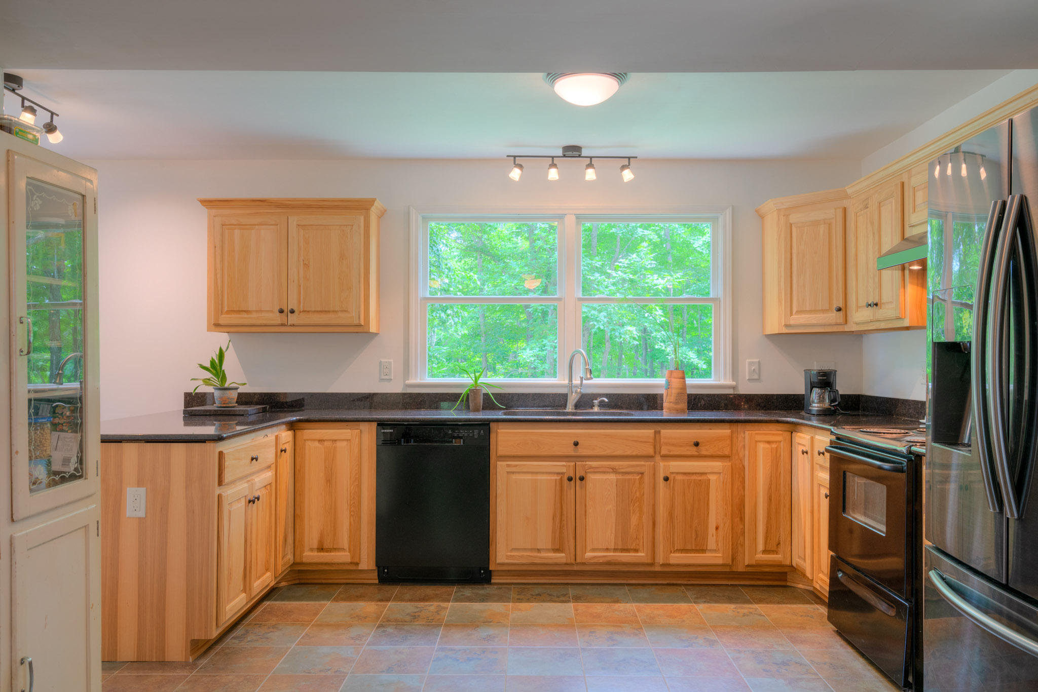 1201 Runnett Bag Road Ferrum, VA 24088 - Photo 17 of 49 a kitchen with a sink stove and cabinets