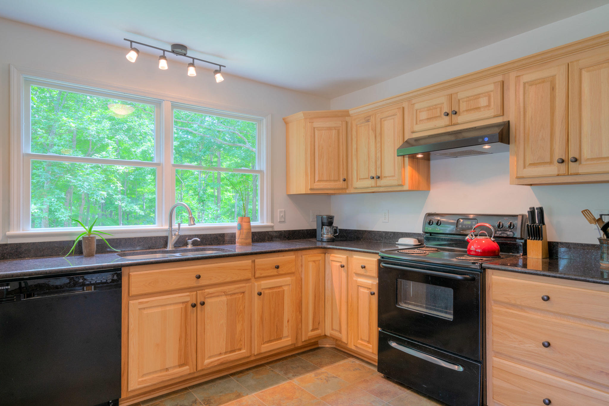 1201 Runnett Bag Road Ferrum, VA 24088 - Photo 18 of 49 a kitchen with a sink stove and cabinets