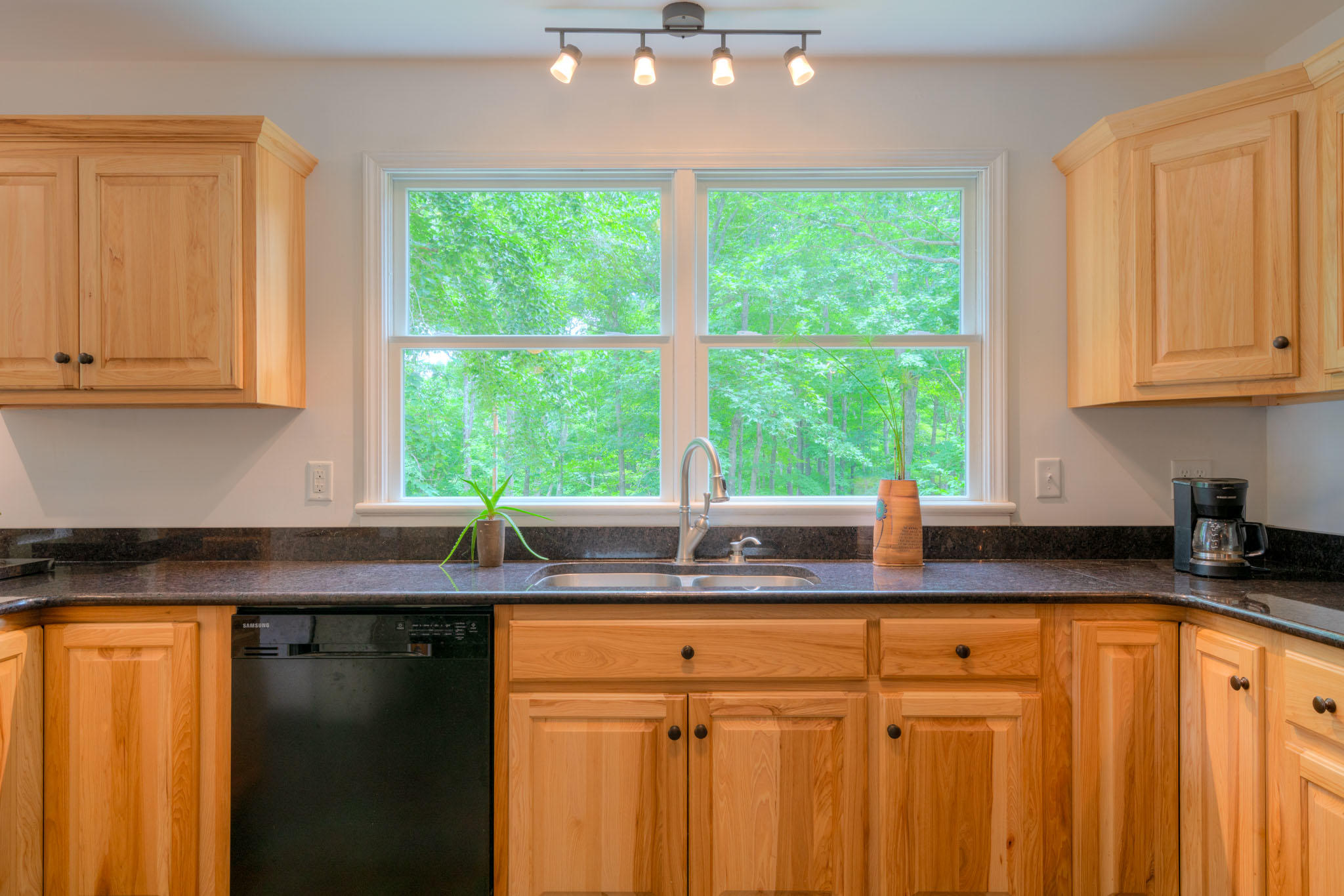 1201 Runnett Bag Road Ferrum, VA 24088 - Photo 19 of 49 a kitchen with granite countertop white cabinets and window