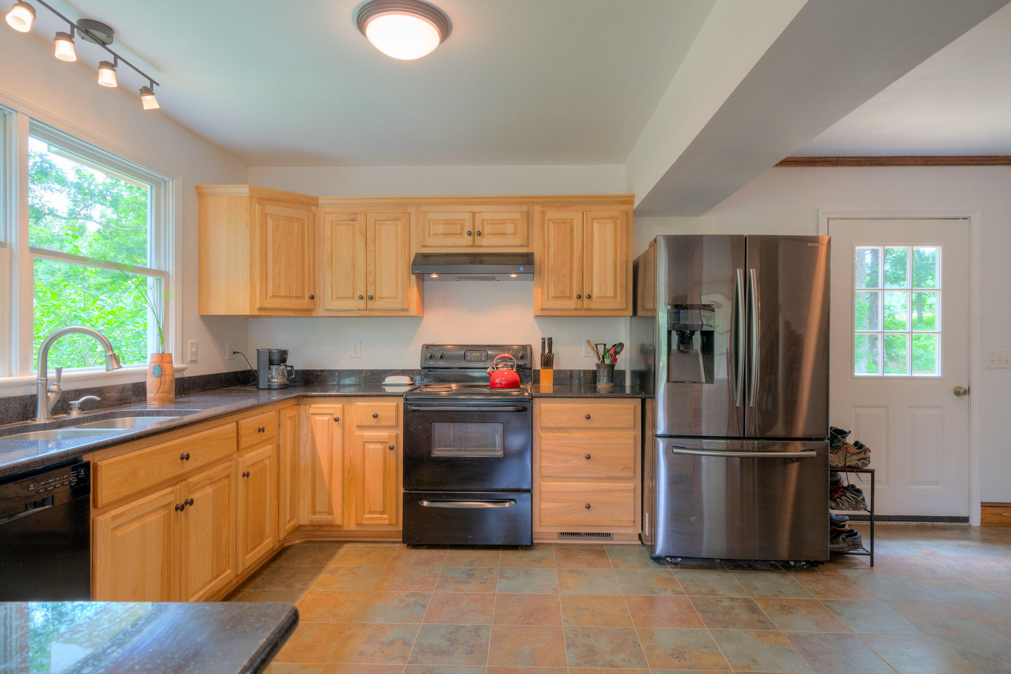 1201 Runnett Bag Road Ferrum, VA 24088 - Photo 3 of 49 a kitchen with stainless steel appliances granite countertop a refrigerator sink and stove