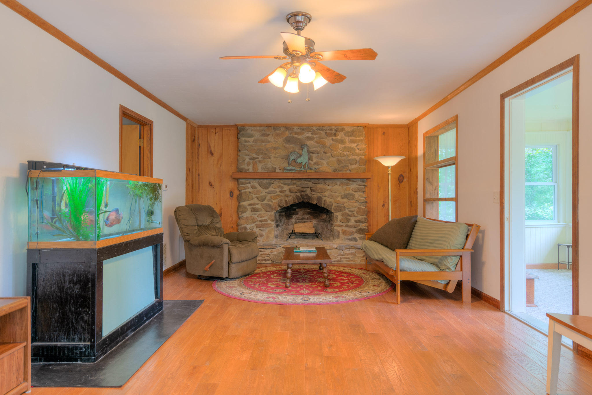 1201 Runnett Bag Road Ferrum, VA 24088 - Photo 4 of 49 a living room with furniture and a fireplace