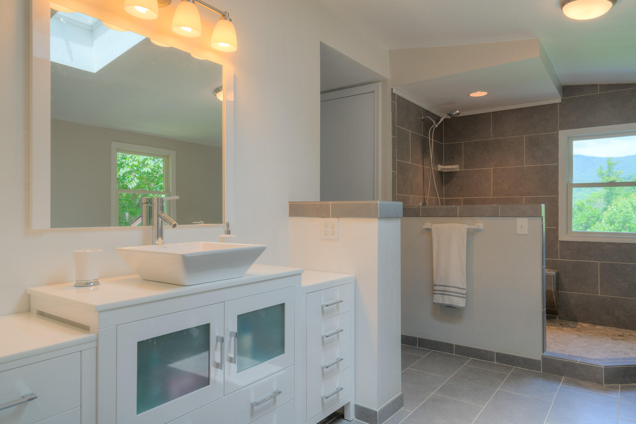 1201 Runnett Bag Road Ferrum, VA 24088 - Photo 35 of 49 a bathroom with a sink and a mirror