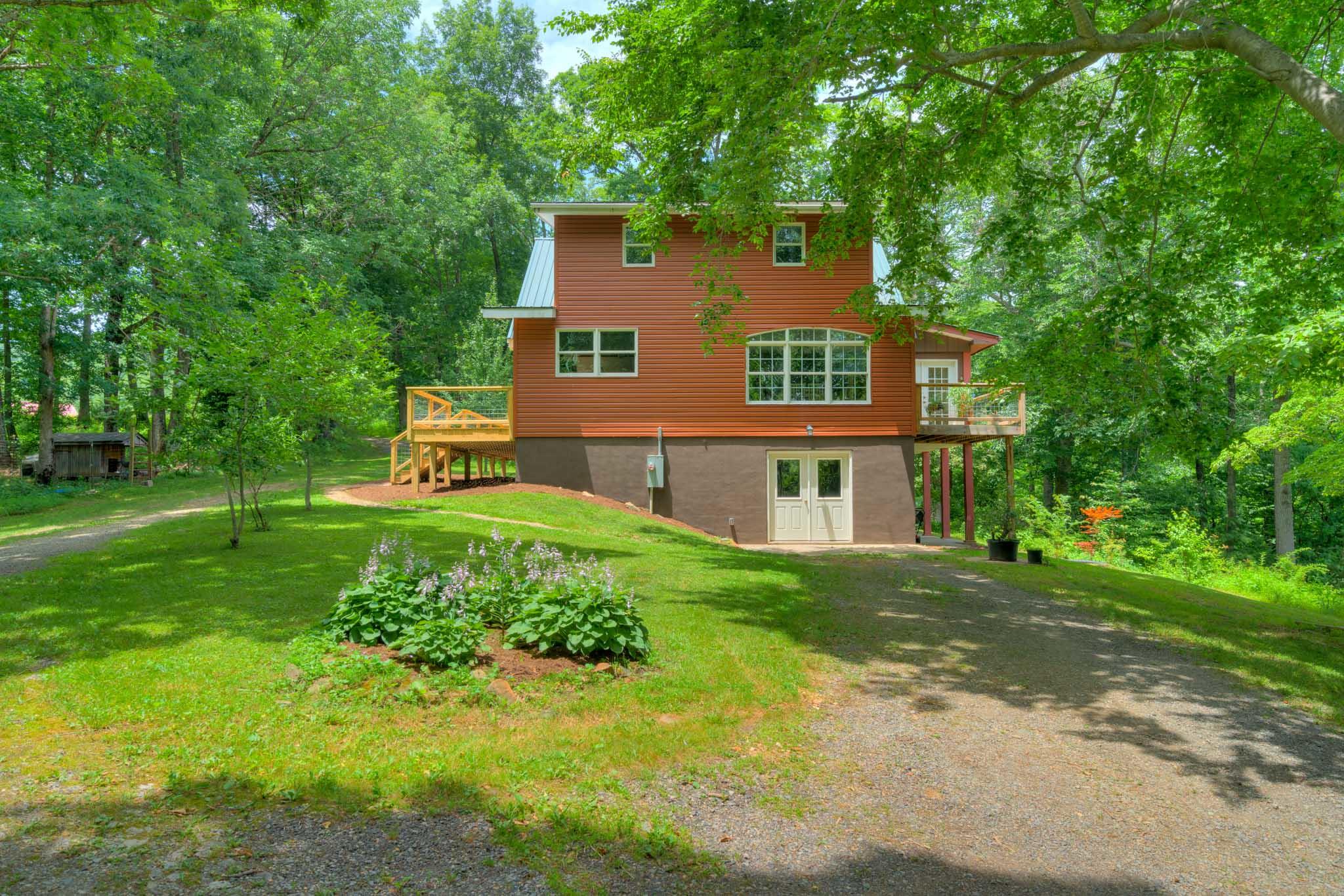 1201 Runnett Bag Road Ferrum, VA 24088 - Photo 9 of 49 a view of a house with a yard
