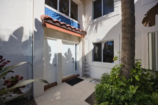 a bathroom with a tub and shower