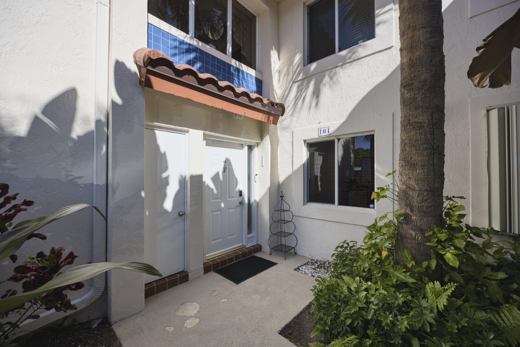 a bathroom with a tub and shower