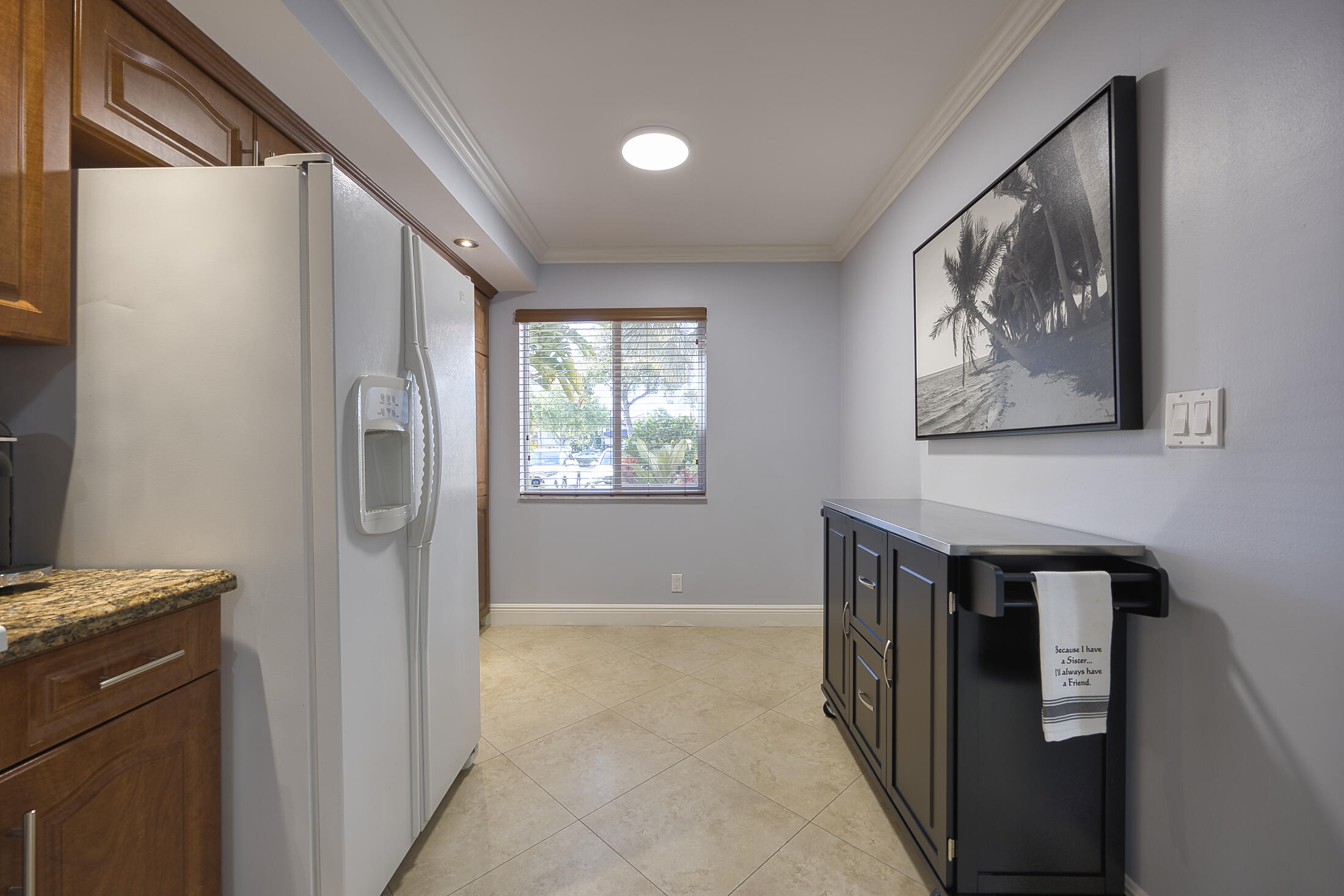 380 Northwest 67th Street, Unit 101 Boca Raton, FL 33487 - Photo 11 of 44 a front view of a house with a entryway