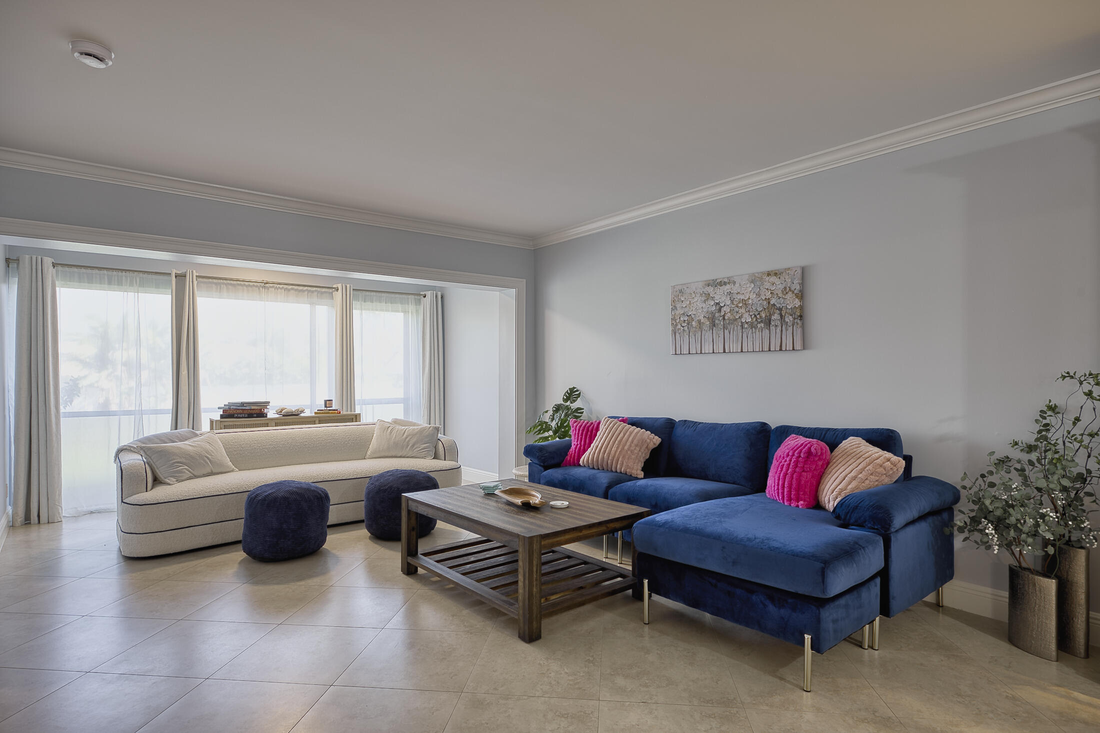 380 Northwest 67th Street, Unit 101 Boca Raton, FL 33487 - Photo 15 of 44 a living room with furniture and a large window