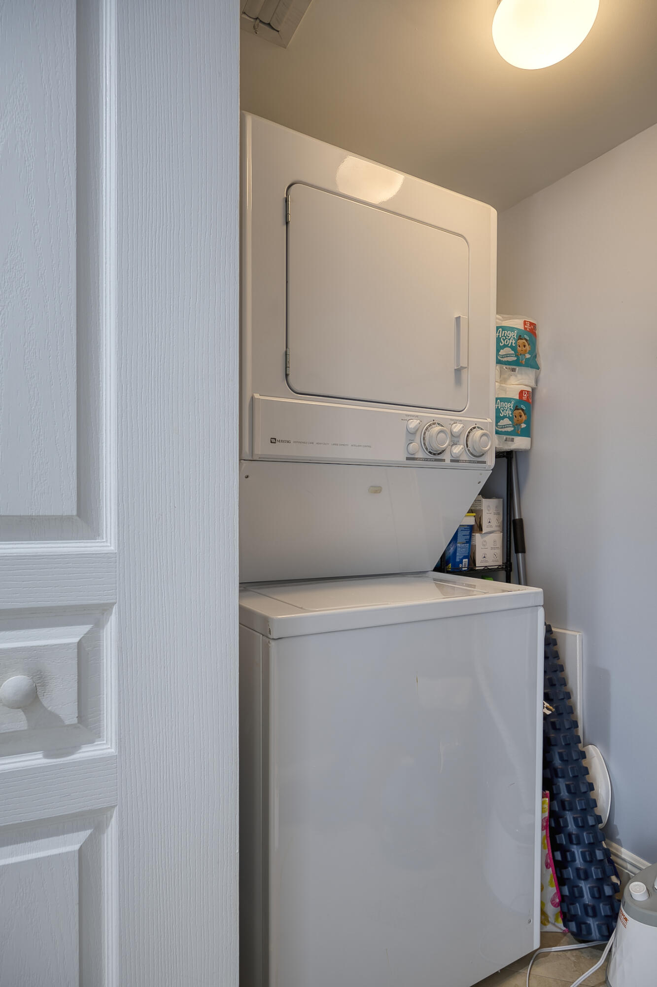 380 Northwest 67th Street, Unit 101 Boca Raton, FL 33487 - Photo 31 of 44 a utility room with dryer and washer