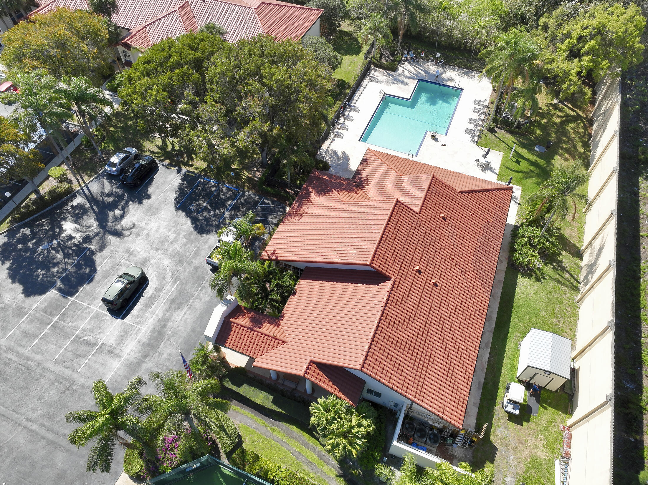 380 Northwest 67th Street, Unit 101 Boca Raton, FL 33487 - Photo 36 of 44 an aerial view of a house with a yard and garden