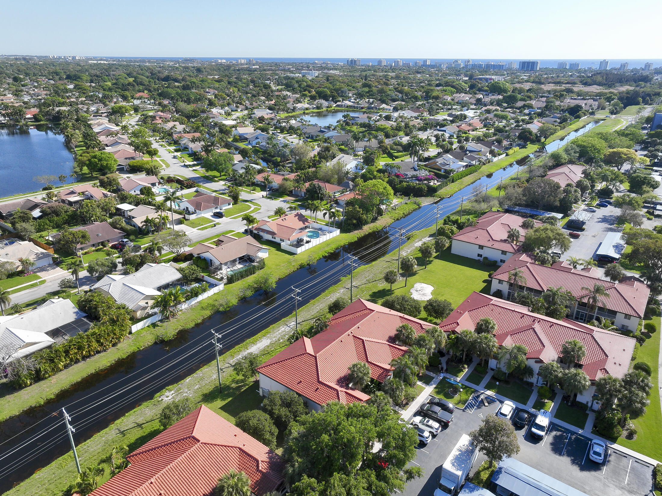 380 Northwest 67th Street, Unit 101 Boca Raton, FL 33487 - Photo 40 of 44 an aerial view of a city