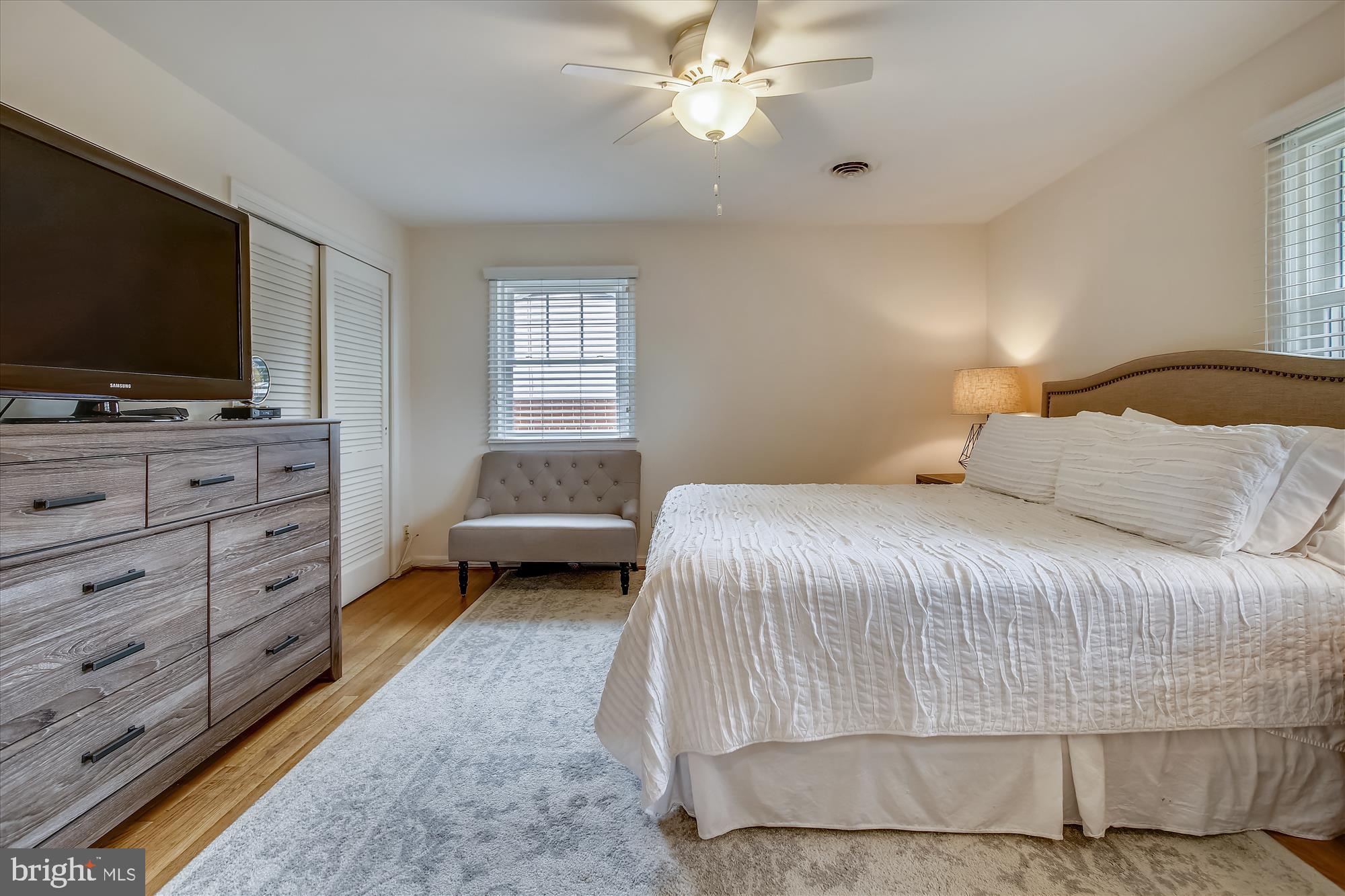 1437 Cola Drive McLean, VA 22101 - Photo 13 of 34 a bedroom with a bed and flat screen tv