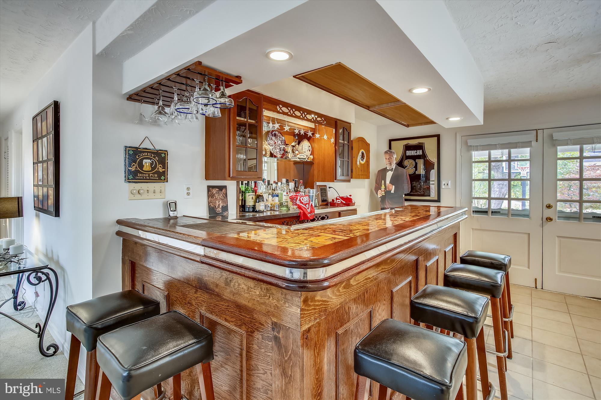 1437 Cola Drive McLean, VA 22101 - Photo 22 of 34 a room with gym equipment and a large mirror