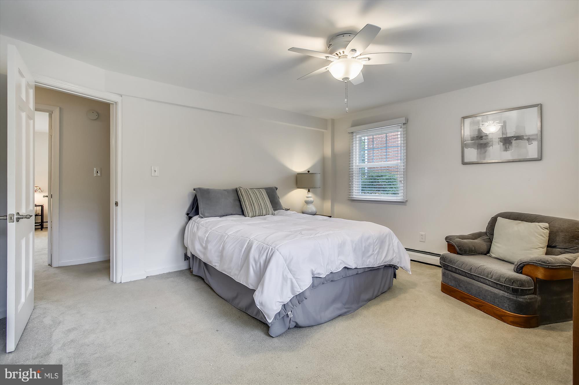 1437 Cola Drive McLean, VA 22101 - Photo 25 of 34 a bedroom with a bed couch and a ceiling fan