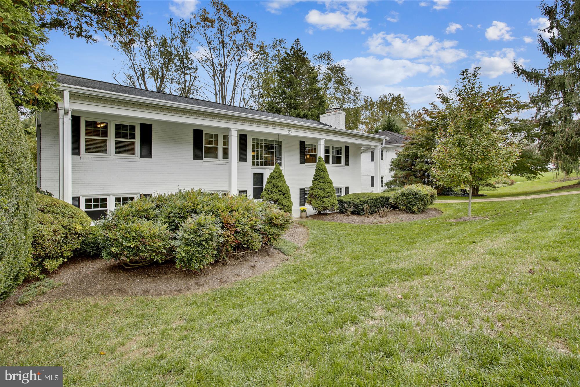 1437 Cola Drive McLean, VA 22101 - Photo 32 of 34 a front view of a house with garden