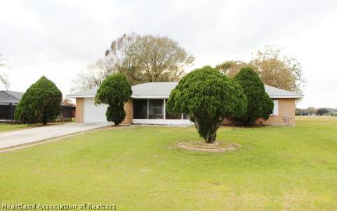 208 Mirador Drive Sebring, FL 33876 - Photo 17 of 17 a house view with a garden space