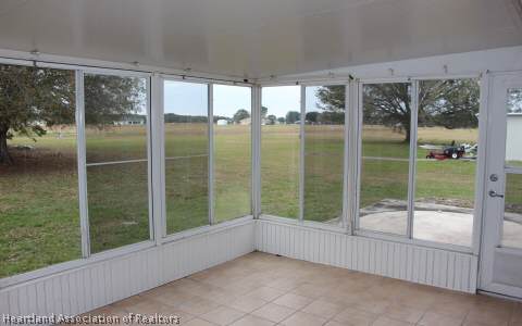 208 Mirador Drive Sebring, FL 33876 - Photo 5 of 17 a view of an empty room and balcony
