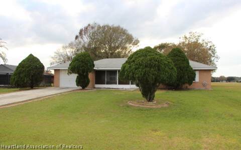 208 Mirador Drive Sebring, FL 33876 - Photo 6 of 17 a house view with a garden space