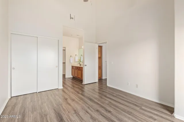 a view of a kitchen with wooden floor