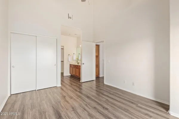 a view of a kitchen with wooden floor
