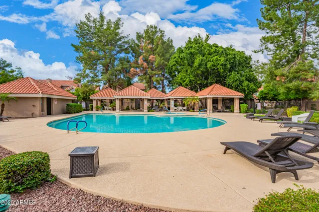 a view of a house with swimming pool