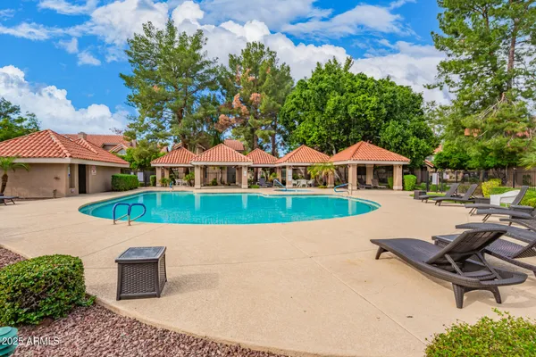 a view of a house with swimming pool