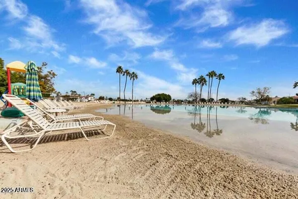a view of a lake with beach