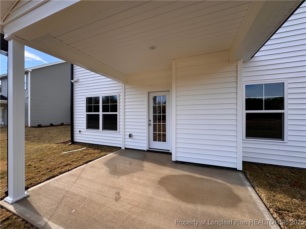 294 Elijah Way Vass, NC 28394 - Photo 32 of 33 a view of a house with a yard
