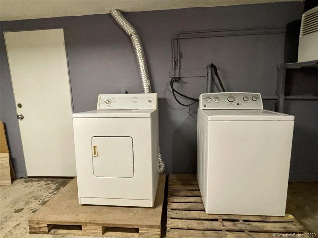 114 South Washington Street, Unit 24 Plainville, CT 06062 - Photo 12 of 14 a utility room with dryer and washer