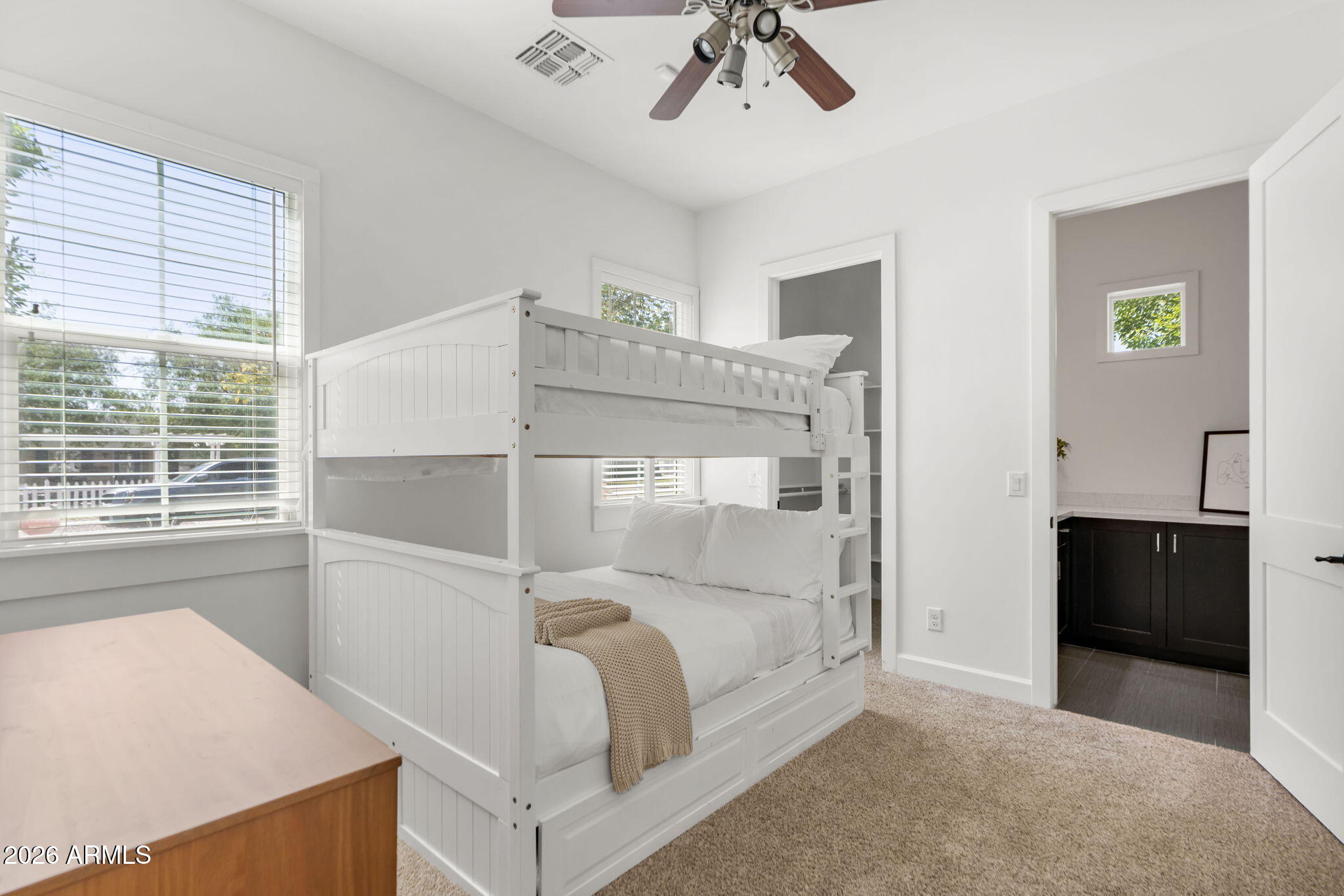 4201 East Cheery Lynn Road Phoenix, AZ 85018 - Photo 19 of 31 a bedroom with a bed and a window