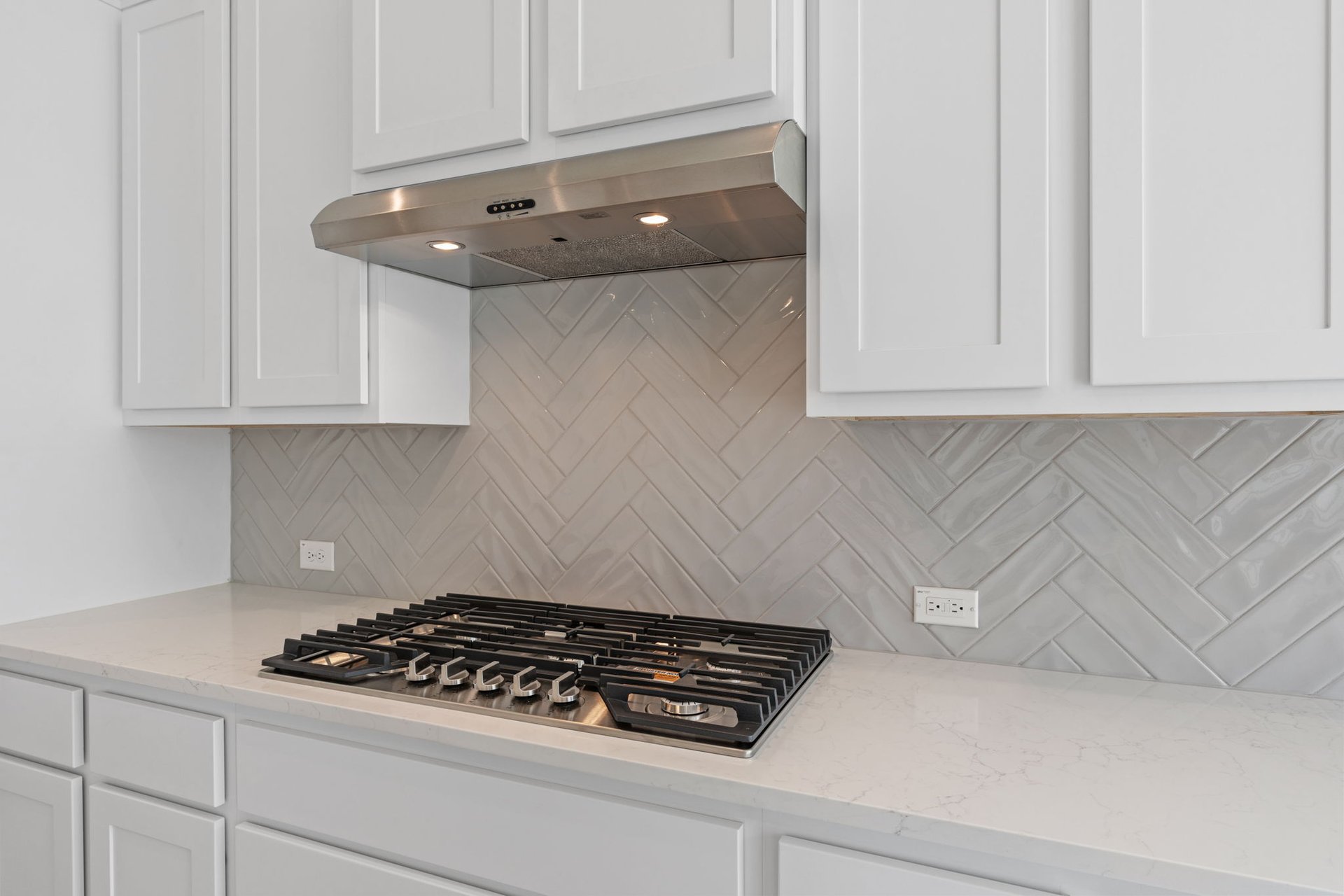 1908 Crimson Sunset Drive Georgetown, TX 78628 - Photo 12 of 40 a kitchen with white cabinets and appliances