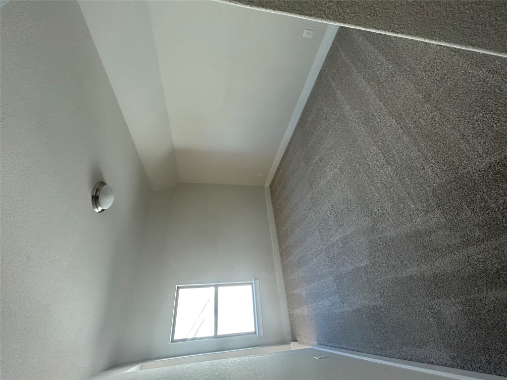 1908 Crimson Sunset Drive Georgetown, TX 78628 - Photo 12 of 22 an empty room with a empty space and windows