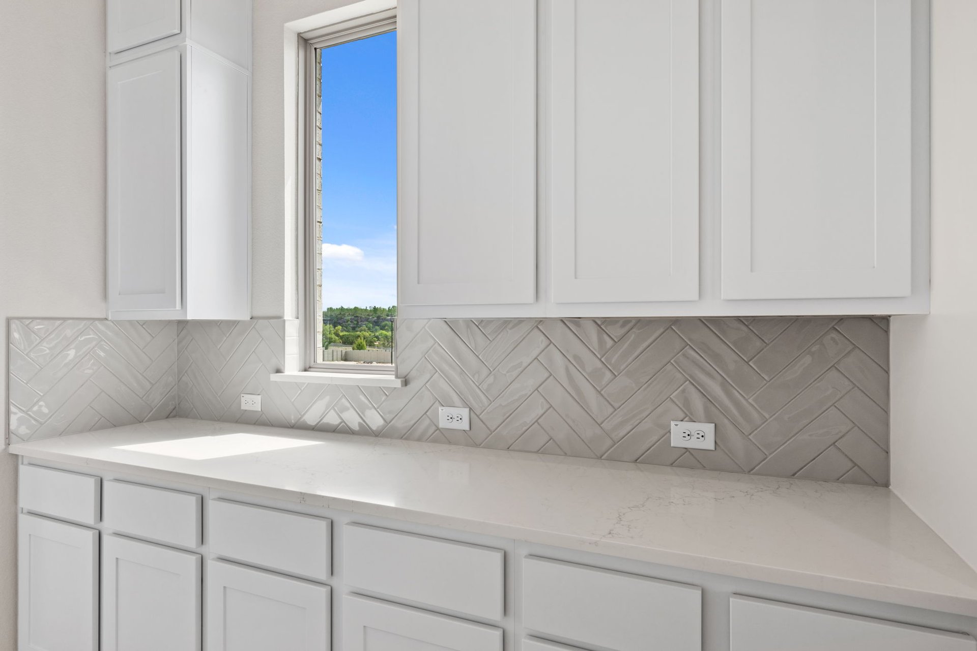 1908 Crimson Sunset Drive Georgetown, TX 78628 - Photo 13 of 40 a kitchen with a white cabinets and a sink