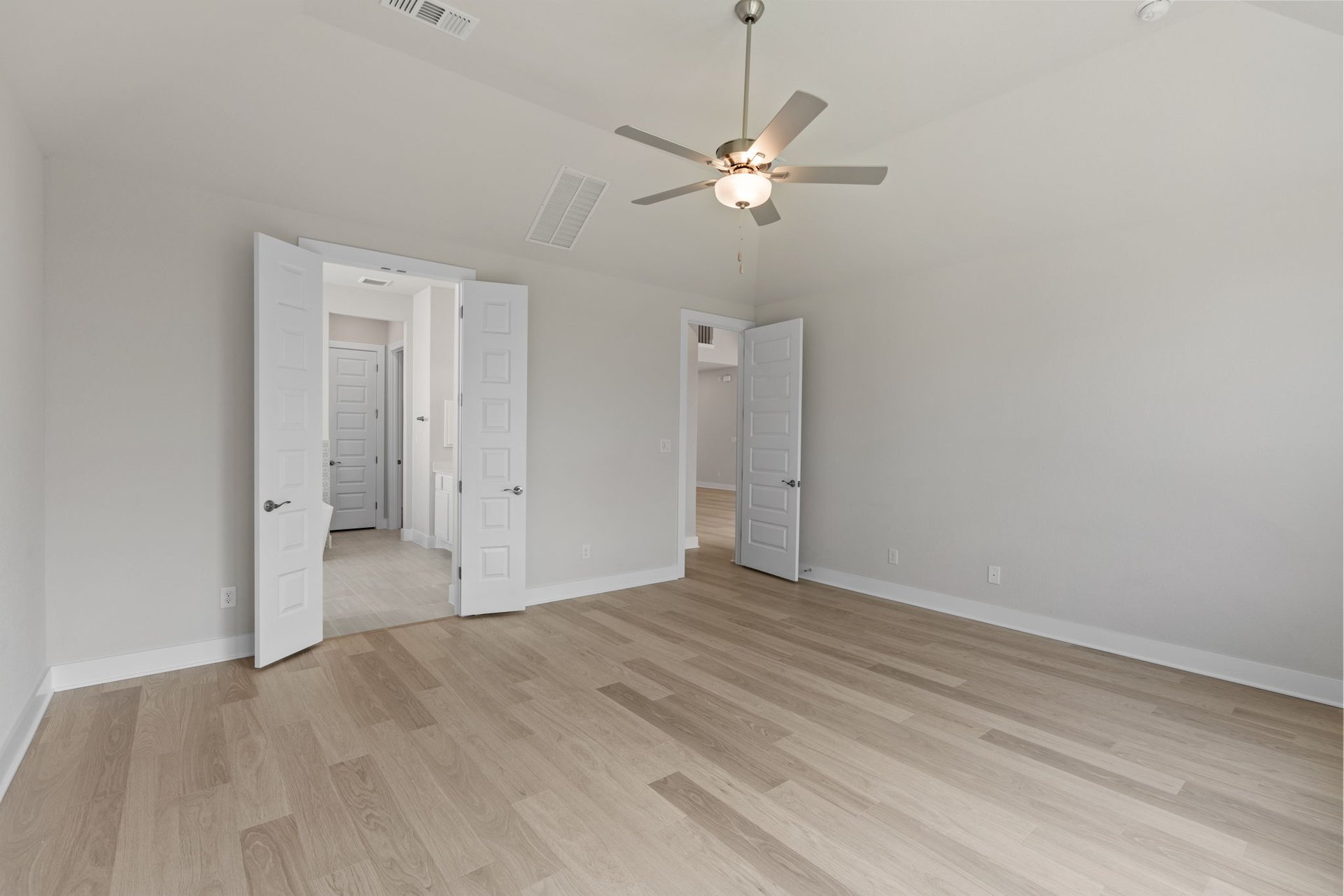 1908 Crimson Sunset Drive Georgetown, TX 78628 - Photo 27 of 40 a view of an empty room with wooden floor