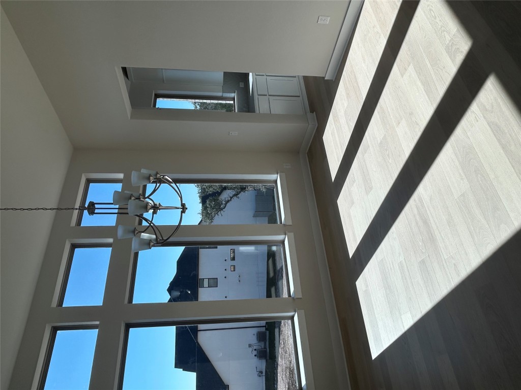 1908 Crimson Sunset Drive Georgetown, TX 78628 - Photo 6 of 22 a bedroom with a bed and window