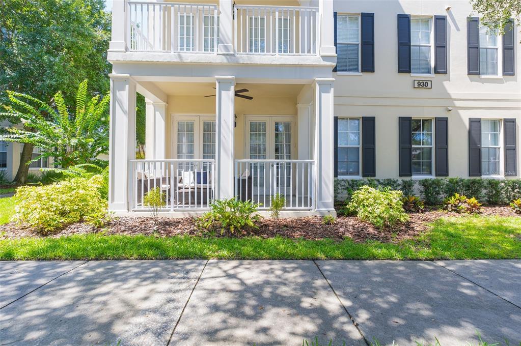 930 Spring Park Street, Unit 103 Kissimmee, FL 34747 - Photo 1 of 40 a view of a house with potted plants