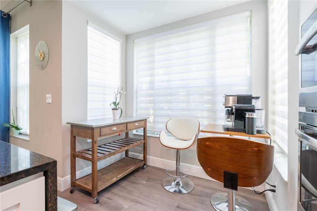 930 Spring Park Street, Unit 103 Kissimmee, FL 34747 - Photo 16 of 40 a living room with furniture a rug and a window