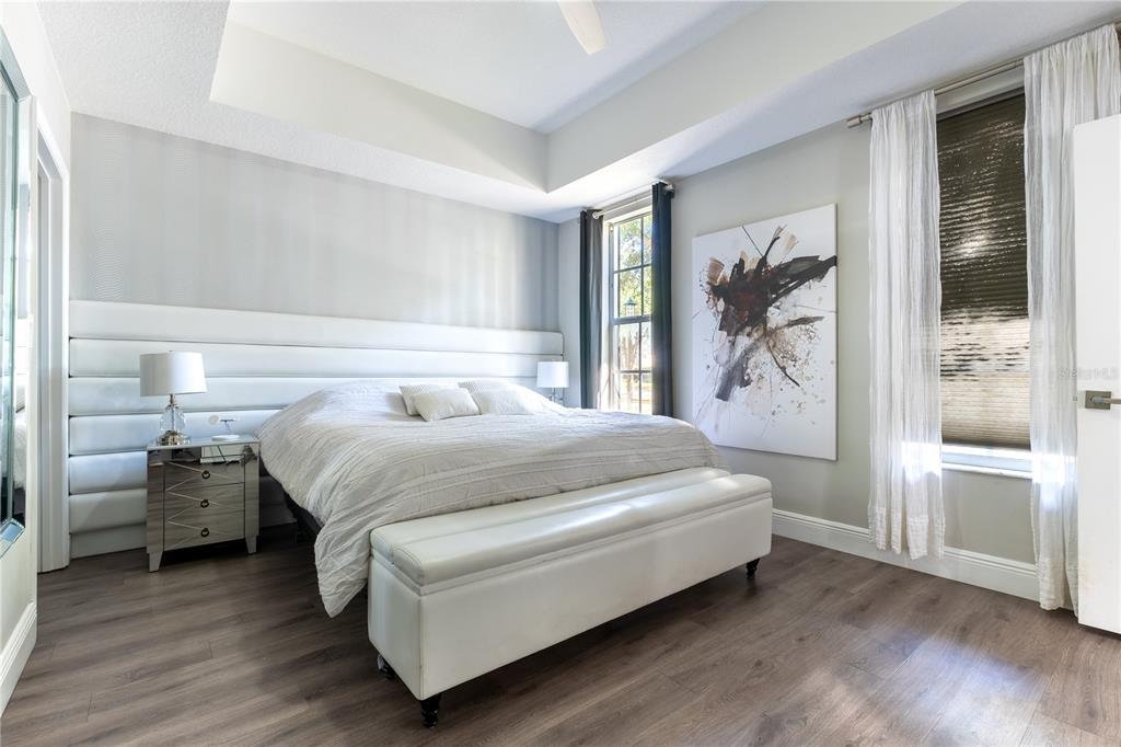 930 Spring Park Street, Unit 103 Kissimmee, FL 34747 - Photo 28 of 40 a bedroom with a bed and a window