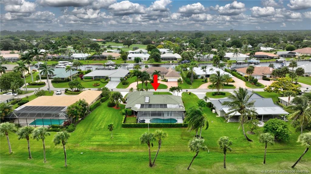3353 Southeast Fairway East Stuart, FL 34997 - Photo 48 of 55 a picture of street view with outdoor space
