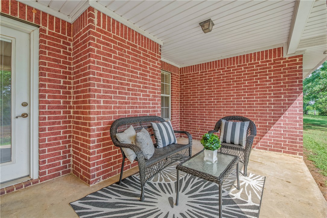 1110 County Road 439 Dime Box, TX 77853 - Photo 37 of 50 a view of a chairs and table in the balcony