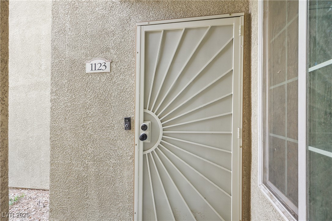 3145 East Flamingo Road, Unit 1123 Las Vegas, NV 89121 - Photo 4 of 30 Entrance to property with stucco siding