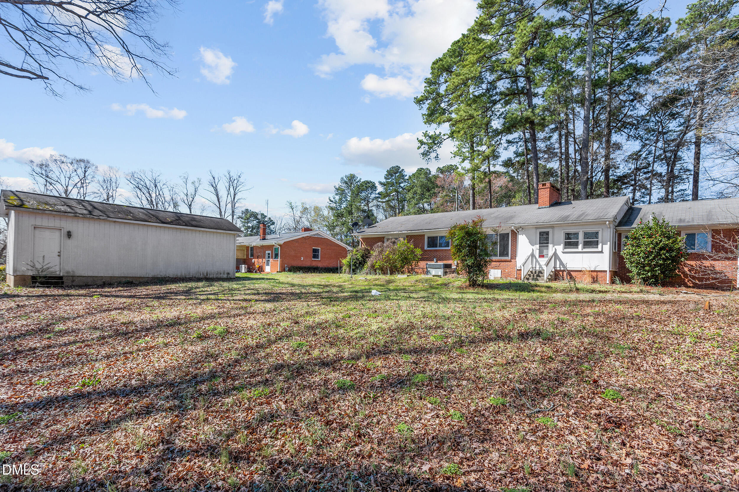 5011 Old Stage Road Raleigh, NC 27603 - Photo 26 of 29 a view of a house with a yard and sitting area