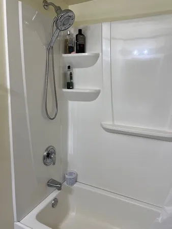 a bathroom with a sink and mirror