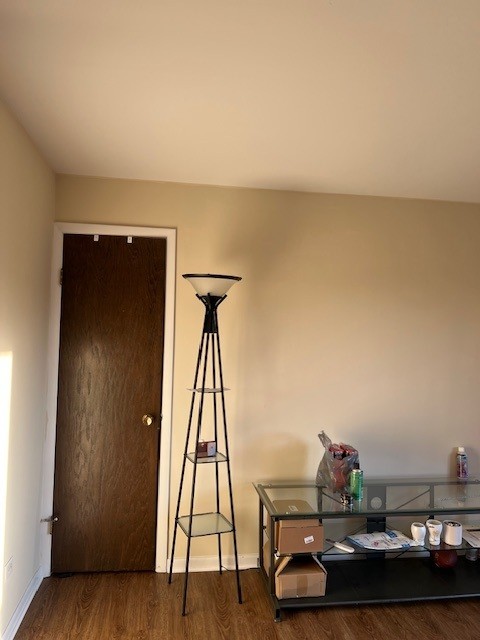 14747 Kenton Avenue, Unit 2A Midlothian, IL 60445 - Photo 12 of 16 a view of a workspace with furniture and wooden floor