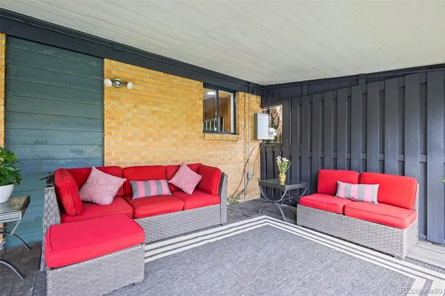 a backyard of a house with seating space