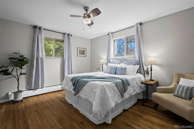 a bedroom with bed and window