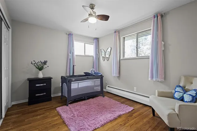 a bed room with a bed and a chandelier