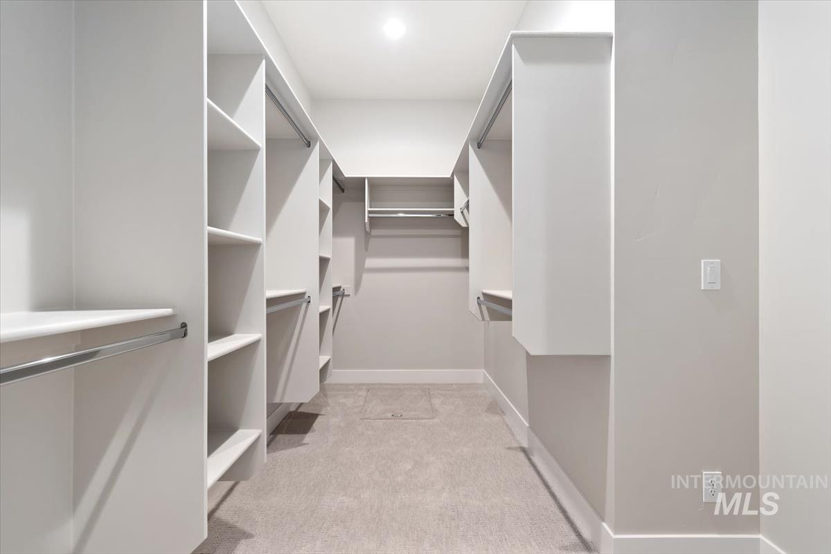2147 East Blakehurst Avenue Kuna, ID 83634 - Photo 26 of 43 Walk in closet with light colored carpet