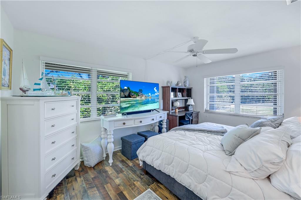 1382 Jamaica Road Marco Island, FL 34145 - Photo 11 of 27 a bed room with a bed and a large window