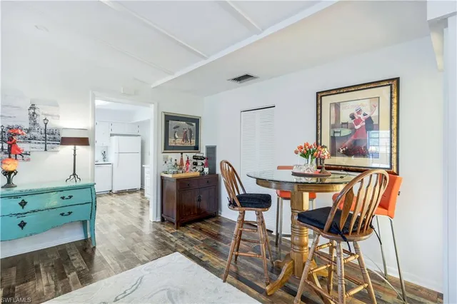 a view of a dining room with furniture